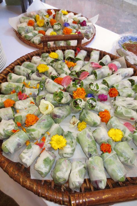 Asian summer rolls with edible flowers from Assaggiare Mendocino Asian Garden Party, Spring Roll Charcuterie Board, Asian Food Wedding Buffet, Asian Grazing Board, Asian Catering Ideas, Asian Themed Charcuterie Board, Asian Grazing Table, Asian Buffet Table Ideas, Thai Wedding Food