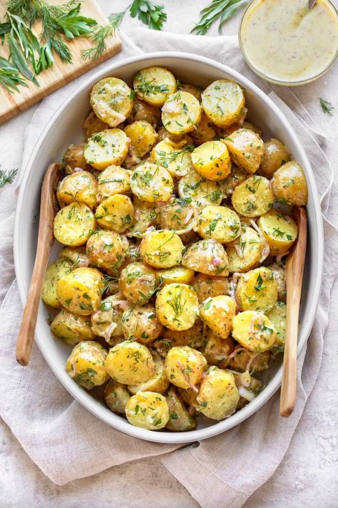 This savory French potato salad with fresh herbs and shallots is a light and vibrant pick, dressed in a mustard vinaigrette instead of mayo! | thecozyapron.com #frenchpotatosalad #frenchpotatosaladrecipe #frenchpotatosaladwithtarragon #frenchpotatosaladdressing #frenchpotatosaladnomayo French Style Potato Salad, Baby Yellow Potatoes, Summer Menu Ideas, Christmas Lunch Recipes, Baby Potato Salad, Salad With Fresh Herbs, Roasted Potato Salad, Deli Style Sandwiches, French Potato Salad