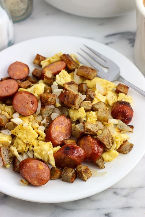 Enjoy breakfast made entirely on the grill with this grilled smoked sausage breakfast egg scramble, featuring eggs, onion, potatoes, and smoked sausages. #GiveLifeMoreFlavor AD Grilled Onion, Breakfast Eggs Scrambled, Breakfast Sausage Links, Egg Scramble, Breakfast Sausage Recipes, Sausage Links, Breakfast Meal, Grill Grates, Awesome Recipes