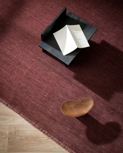 BURGUNDY IS TRENDING! Each day I fall more in love with the beautiful Sandringham 100% wool rug - Merlot - by Baya. This colour is trending, popping up in the latest decor mags (see our latest story.) While it's not the first colour to come to mind for a floor rug, it is surprising how pleasing to the eye it is. Warm and inviting, it adds sophistication, and complements timber accents beautifully. Not sure? Reach out and I can send you a sample to view in your home. You'll be surprised at h... Layering Rugs, Mellow Colors, Merlot Color, Luxurious Interior, Simple Texture, Burgundy Rugs, Piano Room, Layered Rugs, Book Candle