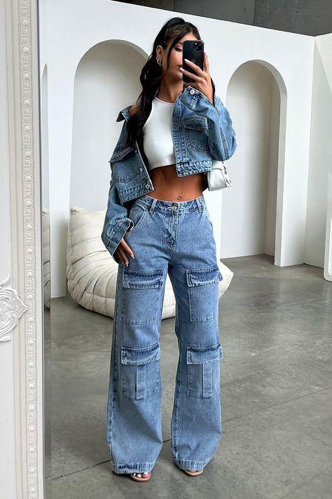 [AffiliateLink] Dare To Make A Statement With Adalia Jeans. These Bold, Blue Denim Jeans Feature Cargo Style Pockets, Belt Loops Around The Waist, Mid Rise, And A Baggy Wide Leg Fit, So You Can Look Your Best. Prepare To Turn Heads And Be The Trendsetter You Are! Match Her With A Blue Denim Jacket And A White Cropped Tee For A Cool And Edgy Look. Fabrication: 85% Cotton / 15% Polyester Sizing: Crystal's Height Is 163Cm/5'3 And Wears A Size Au 8 / Us 2. #croppeddenimjacketoutfit Rok Outfit, Vestiti Edgy, Top Aesthetic, Streetwear Chic, Fest Outfits, Instagram Baddie, Chic Aesthetic, Looks Street Style, Cooler Look