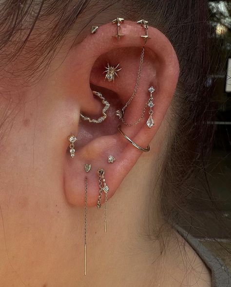 Constellation Piercing Ideas, Stylized Ear Piercing, Styled Ear Piercings Silver, Piercing Inspo Silver, Themed Ear Piercings, Heavily Pierced Ears, Silver Ear Curation, Piercing Stack Ideas, Ear Constellation Piercings