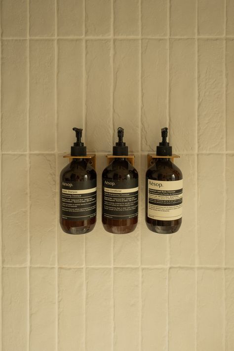 Spa Vibe Bathroom, Milos Photoshoot, Bathroom Product Photography, Aesop Soap, Shampoo And Conditioner Dispenser, Shower Dispenser, Shower Soap Dispenser, Bathroom Retro, Soap Dispenser Wall