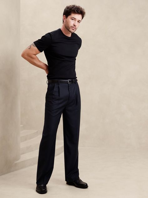 This relaxed pant is expertly cut with a wide leg and puddle hem in our signature Italian hopsack fabric, selected for its basketweave texture and exceptional drape.  Mid rise.  Wide leg with extra length for a break at the hem Fabric from Italy's Reda Mill.  Zip-fly with button closure.  Belt loops.  Four-pocket styling.  Wide-leg fit: High rise.  Tailored for the at-ease fit of traditional trousers, but with the extra wide-leg and full length of puddle-hem pants.  Wide leg opening measures 10" flat.  Inseams: Short 28. 5", Regular 30. 5", Tall 33. 5" Model: Size 32 Regular, 6'2" (188cm). Italian Formal Pants Men, Men's Date Outfit, Mens Black Dress Pants Outfits, Evening Mens Outfit, T Shirt And Trousers Outfit Men, Men Formal Black Outfit, Men Black Trousers Outfit, 90s Mens Celebrity Fashion, Men’s Slacks Outfit