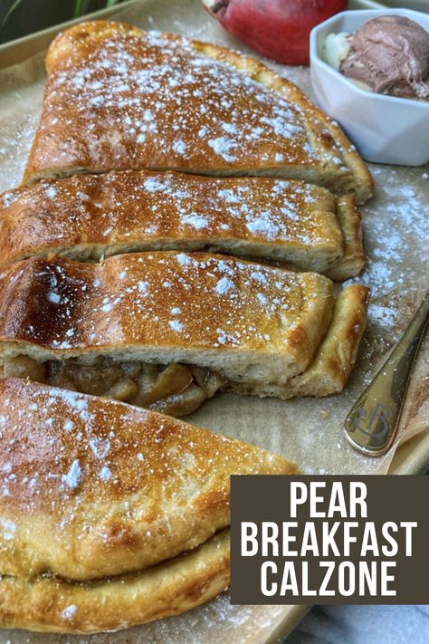 Breakfast calzone recipe made with pizza dough, cinnamon sugar pears, and topped with powdered sugar. This is an easy recipe for homemade breakfast calzones that are vegetarian and yummy. Try this recipe using pizza dough for a fun breakfast idea for kids. The delish pear fruit sauce takes just 15 minutes to make. Bake for 20 minutes in the oven and sprinkle with powdered sugar. For the full recipe visit USAPears.org and follow us on Pinterest for more breakfast recipe ideas! Calzone With Pizza Dough, Breakfast Calzone, Using Pizza Dough, Pear Breakfast, Pear Pizza, Breakfast Recipe Ideas, Calzone Recipe, Pear Dessert, Fun Breakfast