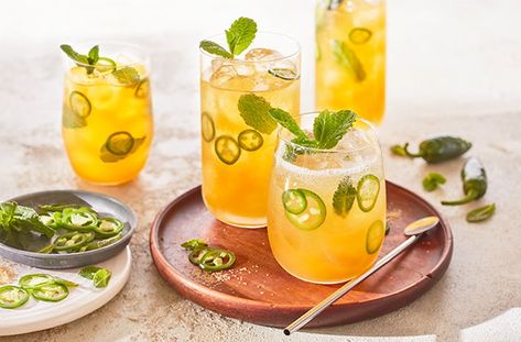 3 ways with rum | Tesco Real Food Spicy Mojito Recipe, Mango Mojito Recipe, Mango Cocktail, Mojito Recept, Mango Mojito, Tesco Real Food, Mango Lassi, Mojito Recipe, Tropical Twist