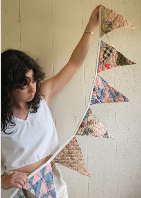 * a great add on if you are getting a quilt coat made!! use the scraps for a bucket hat you will supply us with your own quilt to purchase this item! the pattern created for this bunting is our Reclaim Quilt Bunting - the perfect decor for your home, office, or gift to a friend. Length will be about 80” long - each triangle is roughlt 7” wide and 9.5” long, the binding is 12” on each side. quilts/quilt scraps must measure at least 10" x 60" for a bunting - if you have specific questions about yo Things To Sew With Cotton Fabric, Quilt Backdrop, Simple Scrap Fabric Projects, Cute Sewn Gifts, Easy Things To Sew With Scraps, Sewing Projects For Scraps, Quilted Holiday Gifts, Homemade Sewn Gifts, Quilt Bunting