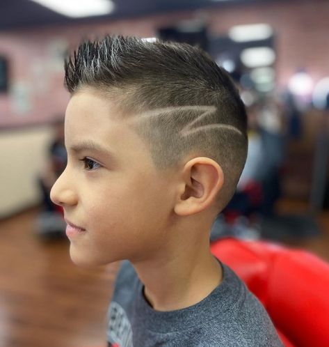 25 Faux Hawk Hairstyles for Boys to Steal The Limelight Boys Faux Hawk, Fohawk Haircut, Hairstyles For Boys, Curly Faux Hawk, Boys Fade Haircut, Mohawk Haircut, Boy Haircuts Short, Cool Boys Haircuts, Tan Skin Blonde Hair