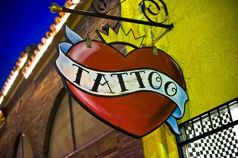 Tattoo Shop Interior, Tattoo Sign, Tattoo Shop Decor, Tattoo Studio Interior, Tattoo Generator, Small Cross Tattoos, Lower Arm Tattoos, Tattoo Poster, Small Neck Tattoos