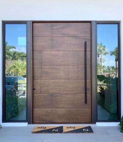 Custom Doors specializes in producing custom mahogany front entry doors, interior doors, windows and flooring. Pivot Doors Entry, Entrance Wood Door, Wooden Door Entrance, Unique Front Doors, House Front Door Design, Modern Entrance Door, Modern Exterior Doors, Custom Front Doors, Main Entrance Door Design