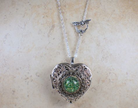 🎶 Unlock the magic within with our stunning Emerald Green Glass Opal Silver Music Box Locket! 💚✨ Perfect for storing your precious keepsakes and playing your favorite tunes, this locket is a must-have for any jewelry lover. 💍 Only $100.00, get yours now and add some sparkle to your life! ✨ #MusicBoxLocket #EmeraldGreen #Opal #Silver #JewelryLover #TreasureKeeper #Magical #MusicBox #Sparkle #LimitedEdition #Shop Shop Now https://bit.ly/3Bl9vmC Music Box Necklace, Music Box Locket, Heart Shaped Locket, Large Locket, Box Necklace, Pendant Heart, Photo Locket, Green Opal, Necklace Box