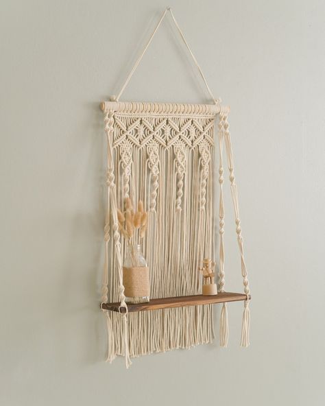 Hey there! Spruce up your space with our amazing Macrame Wall Shelf! It's like the perfect blend of boho vibes and modern practicality. If you're all about that minimalist yet stylish look, this custom hanging shelf is a total must-have. And guess what? It fits right in anywhere – whether it's your cozy nursery or your bustling living room. Trust me, it's the ultimate housewarming gift! Each shelf is handcrafted with love using Natural Pure Cotton Cord. How cool is that? 🌟 Check out these b... Boho Wall Shelf, Bohemian Shelf, Macrame Wall Shelf, Custom Shelf, Macrame Hanging Shelf, Macrame Shelf, Boho Room Decor, Needle Embroidery, Hanging Shelf