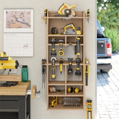 Unleash the potential of your garage with the 48" extra large vertical wall mount tool organizer. With its grain-free stability, the MDF construction surpasses solid wood by resisting expansion and contraction in hot and cold climates, ensuring longevity without warping. This exceptional durability guarantees a haven for your tools without any risk of dings or nicks to edges and blades that can be found when using metal alternatives. The tool organizer holds up to 8 drills, hammers, hand tools, Small Garage Tool Organization, Garage Storage And Man Cave, Power Tool Storage Diy, Screw Storage Ideas, French Cleat Tool Storage, Tool Wall Storage, Garage Wall Storage, Tool Wall, Power Tool Organizer