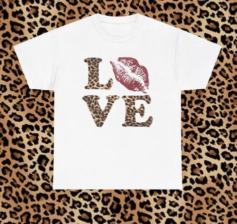 Express your love for Y2K fashion with our Leopard Cheetah Love Kiss Tee! This 2000s vintage graphic t-shirt is perfect for any gender and casual wear. Add a touch of nostalgia and style to your wardrobe with this trendy piece.     Product information:    Fabric name: milk silk     Size Information:  Size: XS, S, M, L, XL, XXL, XXXL, XXXXL             size Length Shoulder bust   XS 59 37 40*2   S 63 40 44*2   M 69 43 47*2   L 71 46 50*2   XL 72 48 52*2   2XL 75 51 55*2   3XL 76 53 59*2   4XL 79 I Love Shirts, Graphic Tees Design Prints, Leopard Print T Shirt, 2000s Vintage, Printed Tshirt, Leopard Shirt, Leopard Print Shirt, Y2k 2000s, Label Machine