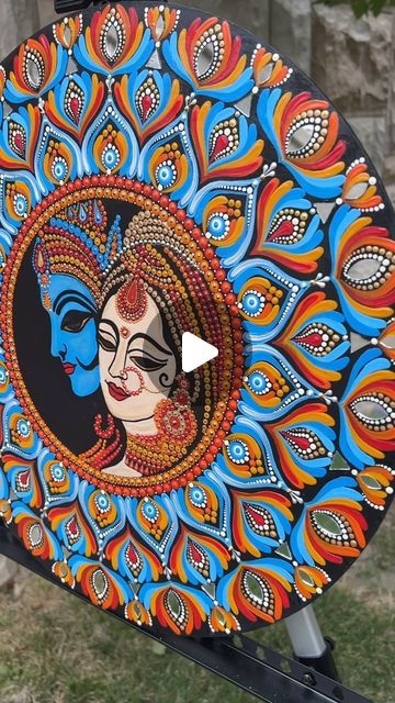 10 likes, 5 comments - anaadee.hunar on September 8, 2024: "Just finished this colorful mandala in blue, yellow, orange, and red tones, decorated with delicate white and gold pearl dots and small mirrors. Radha Krishna in the center adds a divine touch to the piece🧿🕉️🧿😍😍 . . . . . . . . . . . . . .". Colorful Mandala, Blue Yellow Orange, Dot Mandala, September 8, Small Mirrors, Mandala Coloring, Radha Krishna, Gold Pearl, Yellow Orange