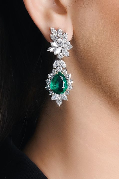 Pair of emerald and diamond ear clips | Magnificent Jewels and Noble Jewels | | Sotheby's Diamond And Emerald Earrings, Contemporary Diamond Earrings, Ear Ring Ideas, Long Diamond Earrings Unique, Diamond Earing Designs Unique, Real Diamond Earrings Unique, Long Earrings Diamond, Emerald Jewelry Earrings, Diamond Earrings Tiffany