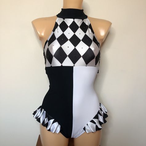 PLEASE READ ALL INFORMATION BEFORE ORDERING Robyn Hearts Training & Performance Wear. Dance, Aerial, Pole & Circus. "PIERROT-QUIN" Black & White Harlequin Pierrot Costume ~ High Neck Halter Leotard, with Colour Block Split Body Panels and Harlequin Hip Frills. Finished With Black, White and AB Crystals. Fully lined in soft beige. Matching Cuffs Available Here : https://www.etsy.com/uk/listing/1505880121/ Handmade with High Quality Patterned & Matte Lycra, Fully lined for extra support and durabi Circus Master Costume Women, Acrobat Clothes, Clown Dance Costume, Contortionist Outfit, Circus Performer Outfit, Circus Theme Costume Women, Circus Acrobat Outfit, Black And White Clown Outfit, Rock Dance Costume