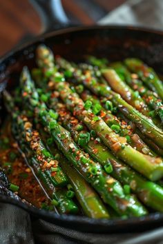 Looking for a quick and delicious side dish? Try this flavorful skillet asparagus recipe tonight! Tender asparagus cooked to perfection in a hot skillet with garlic, lemon, and parmesan cheese. This easy-to-make recipe is perfect for any meal. Serve it alongside your favorite main course or enjoy it on its own. This skillet asparagus dish will become a regular favorite at your dinner table! Asparagus Ideas Easy Recipes, Parmesan Asparagus Skillet, Best Ways To Cook Asparagus, Asparagus In Pan, Cabbage And Asparagus Recipes, Asparagus And Bell Pepper Recipes, Asparagus With Almonds, Asparagus Recipes For Christmas, Holiday Asparagus Recipes