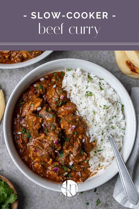 Made with curry powder, coconut milk, and tomatoes, this Indian-style slow cooker beef curry is full of flavor while being easy to make. Essen, Slow Cooker Thai Beef Curry, Slow Cooker Beef Cheeks, Slow Cooker Beef Curry Recipes, Crockpot Beef Curry, Crockpot Meals With Beef, Beef Indian Recipes, Curry Crockpot Recipes, Autumn Slow Cooker Recipes