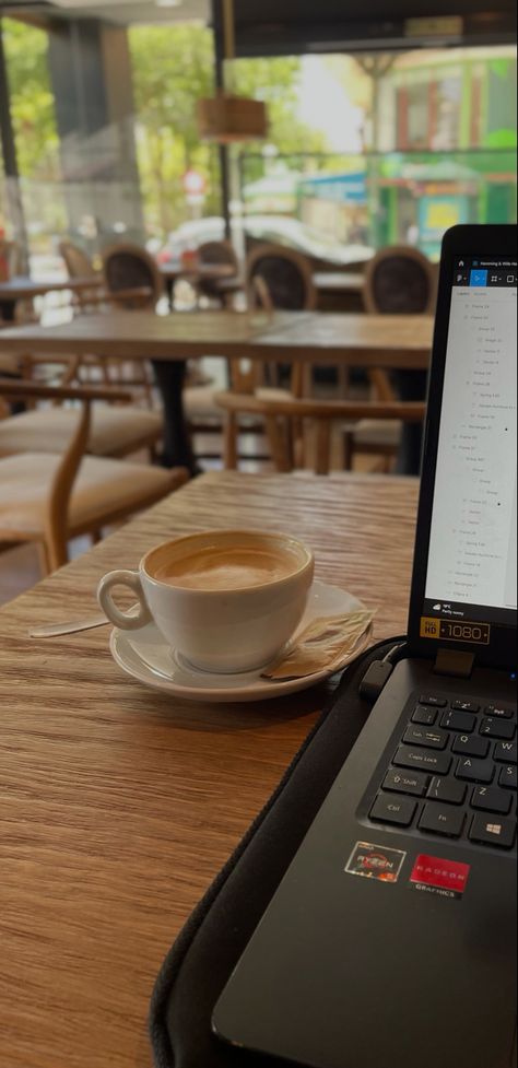 Coffee next to a laptop Coffee At Work Aesthetic, Work In Coffee Shop Aesthetic, Work Aesthetic Office Coffee, Working Coffee Shop Aesthetic, Getting Work Done Aesthetic, Work Cafe Aesthetic, Work In Coffee Shop, Working From Coffee Shop, Work In Cafe Aesthetic