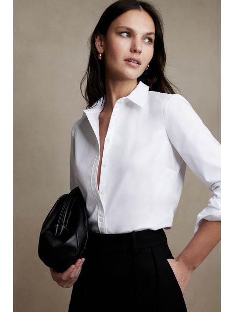 Our fitted shirt with darts at the back that nip in the waist for a tailored look.  Now in a shorter length that’s perfect tucked or untucked.  Made in our super-stretch cotton poplin for a flattering, comfortable fit.  Point collar.  Clean front.