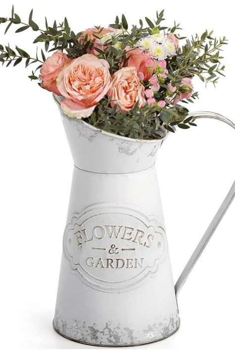 Farmhouse Decor: The color of this metal pitcher vase is more an off white and simulate old-style design, the shape of each scar are designed, it contains the memory of time. Bring a feel of rustic/shabby chic style, it perfect for farmhouse/country/vintage decor.
Vase for Flowers: The elegant white vase is suitable for any dried flower and artificial flowers decoration. Metal Milk Jug, Shabby Chic Vase, Milk Jug Vase, Shabby Chic Vases, Leaf Bouquet, Milk Jar, Farm Cottage, Jug Vase, Metal Vase