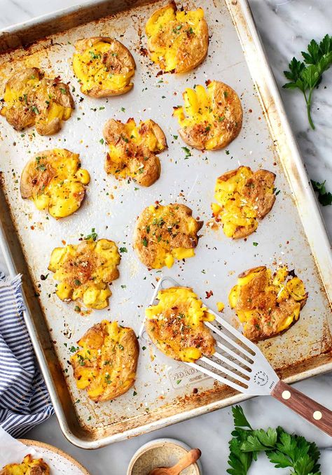 These crispy smashed potatoes are an easy, delicious appetizer or side dish! They're boiled until tender, smashed, and then baked to crispy, golden brown perfection. Smashed Golden Potatoes, Smashed Potatoes Baked, Tasty Potato Recipes, Golden Potatoes, Smashed Potatoes Recipe, Creamy Dill Sauce, Crispy Smashed Potatoes, Parmesan Cheese Potatoes, Bbq Sandwich