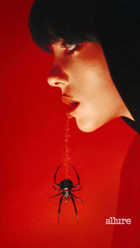 Close up of Billie Eilish for Allure Magazine, wearing black on a red background with a spider hanging from her mouth. September 28, Billie Eilish, A Woman, Red, Beauty, Instagram