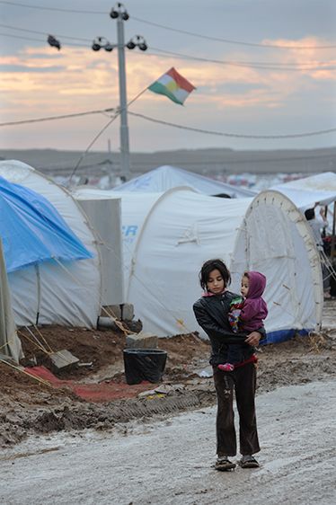 A Syrian girl holds a younger child in a refugee camp in northern Iraq. Some 2 million Syrian children are in need of assistance. I remember when Syria took in the Iraq refugees, now the tables are turned. When is this going to STOP!!! Bilderberg Group, Save Syria, Lode A Dio, Arab Girl, Syrian Children, Heart Aches, Refugee Camp, Poor Children, World Peace