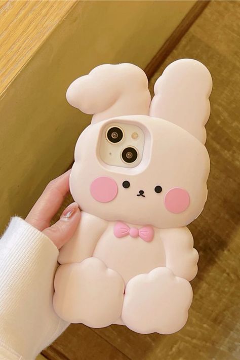 Looking for a phone case that's as cute as it is stylish? Look no further than our cute pink bunny phone case! Featuring an adorable bunny design in a soft pink hue, this case is the perfect choice for anyone who wants to add a touch of whimsy and charm to their phone. So why wait? Treat yourself to the ultimate in phone protection and style with our must-have cute pink bunny phone case today! Bunny Phone Case, Fluffy Phone Cases, Diy Cape, Clay Plates, Bunny Design, Big Ears, Kawaii Phone Case, Diy Jar Crafts, Adorable Bunny