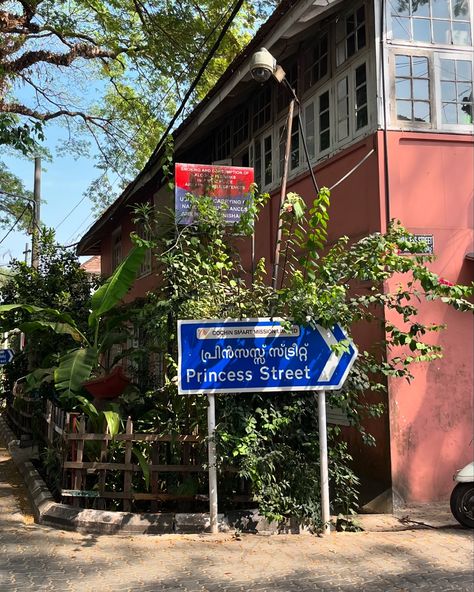 Fort Kochi Aesthetic, Kochi Aesthetics, Fort Kochi Beach, Aesthetic Cafes, Version Board, Fort Kochi, Dance Shoot, Colourful Buildings, Cycling Art