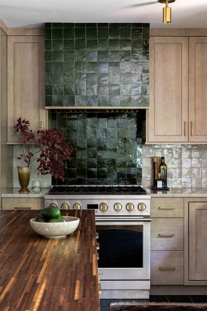 30 Bold and Beautiful Range Backsplashes Range Hood Tile Backsplash, Bold Tile Backsplash Kitchen, Tiled Kitchen Hood, Range Backsplash With Shelf, Tiled Stove Hood, Curved Backsplash Behind Stove, Bold Backsplash Kitchen, Kitchen Backsplash Focal Point Stove, Range Backsplash Ideas