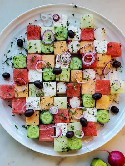 A composed summer salad with the refreshing combination of melon and feta. Cucumber, olives and radishes join in, and a perfect honey lemon vinaigrettte finishes it off. This can be stored and it won't go limp! #watermelonandfetasalad #melonfetasalad #summermelonsalad #feta #summer #picnicfood #summersalad #salad Oliver Platt, Melon Salad, Olive Salad, Backyard Seating, Persian Cucumber, Honeydew Melon, Lemon Vinaigrette, Barbie Kitchen, Paint Diy