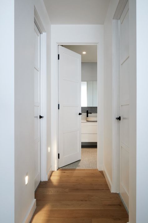 White Internal Doors With Black Handles, White Door With Black Handle, White Doors Black Handles, White Doors With Black Handles, White Door Black Handle, White Inside Doors, All White Aesthetic, Hallway With Doors, Hallway Colour Schemes