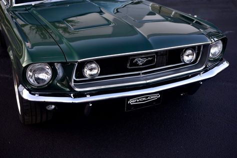 This is a 1968 Mustang GT 2+2 Fastback RHD in Highland Green Metallic. It has Black Nappa leather interior. This car has 17x8 American Racing Torq Thrust VN215 wheels. It features a 460hp Ford 5.0L Ti-VCT Coyote DOHC V8 engine and a Ford 10R80 10-speed electronically controlled automatic transmission. #mustang #shelby #classicmustang #classicshelby #carinspiration #green #greencar #classiccar Green Mustang Aesthetic, Ford Mustang Shelby Gt500 Green, Dark Green Mustang, 1968 Mustang Gt, Green Mustang, Ford Mustang Eleanor, 1968 Ford Mustang Fastback, Mustang 1969, Ford Mustang 1967