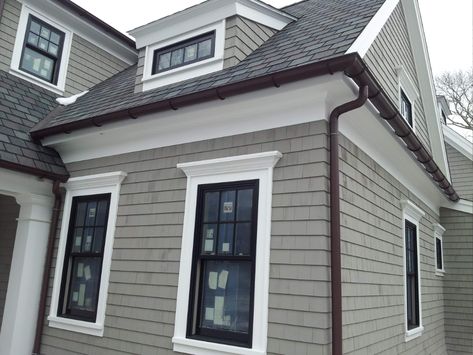 musket brown Garage Dormers Ideas Exterior, Grey Exterior With Black Windows, Cape Cod House Exterior Remodel, Exterior Moldings And Trim, Exterior House Trim, Cape House Exterior, Black Gutters, Cape Cod Exterior, Exterior Siding Options