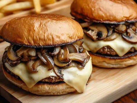 Juicy Mushroom Swiss Burger Recipe – The Best Melt-in-Your-Mouth Burger You’ll Ever Taste - NewsBreak Mushroom Swiss Burger Recipe, Swiss Burger, Mushroom Swiss Burger, Crispy Sweet Potato Fries, Onion Burger, Crab Cake Recipe, Parmesan Cream Sauce, Crispy Sweet Potato, Beef Patties