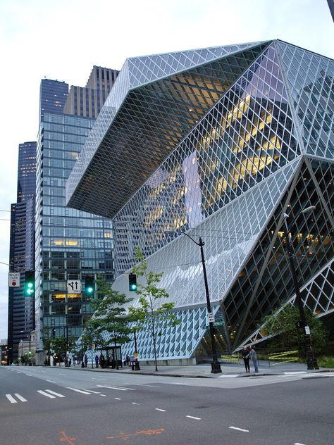 This modern glass structure in Washington is hard to miss.                  Source: Shutterstock Deconstructivism Architecture, Oma Architecture, Seattle Library, Seattle Central Library, Seattle Public Library, Deconstructivism, Commercial And Office Architecture, Beautiful Library, Rem Koolhaas