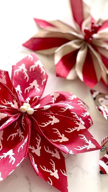 Allison Robertson on Instagram: "Poinsettia bows are the coolest new bow to make this season! They are SO EASY! 📣Sound on to hear the full tutorial 📣 #bowtutorial #ribbonbow #christmasbow" How To Make Poinsettia Bows, Poinsettia Bows Diy, Poinsettia Diy How To Make, How To Make Pointsetta Flowers, Poinsettia Bow Diy, Gift Wrapping Ribbon Ideas Bow Tutorial, Ribbon Poinsettia Diy, Gift Bows Diy Ribbon Easy, Christmas Tree Bows Diy