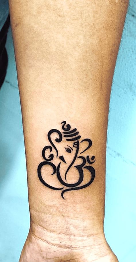 Hindu God Tattoo For Women, Om And Ganesh Tattoo Design, Simple Ganesh Tattoo, Ganesh And Om Tattoo, Ganesh Tatoos Design, Krishna Symbol Tattoo, Ganesha Tattoo Design For Men, Small Ganesha Tattoo, Lord Ganesha Tattoo Design