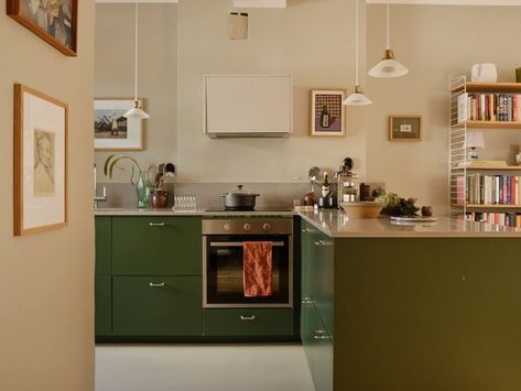 A Beautiful Calm and Natural Apartment with a Green Kitchen 8 Natural Apartment, Small Kitchen Apartment, Green Kitchen Cupboards, 1930s Apartment, Calm Kitchen, Huge Balcony, Kitchen 2025, Tiny Studio Apartments, Bungalow Kitchen