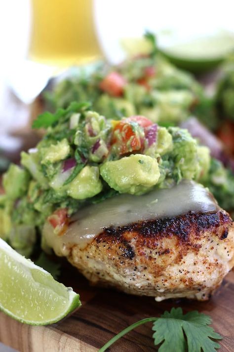 Easy Seared Chicken Guacamole has tender juicy dry rubbed chicken topped with melted Jack cheese and life-changing homemade guacamole. This is one of the best dinners for healthy and fun eating. #GuacamoleChickenMelt #GuacamoleChicken #EasyChickenDinner #LowCarbDinner #ChickenGuacamole #SearedChicken https://www.thefedupfoodie.com Easy Clean Eating Meals, Homemade Guacamole Easy, Chicken Guacamole, Chicken Avocado Sandwich, Guacamole Chicken, Avocado Chicken Salad Recipe, Best Dinners, Top Dinner Recipes, Clean Eating Vegetarian