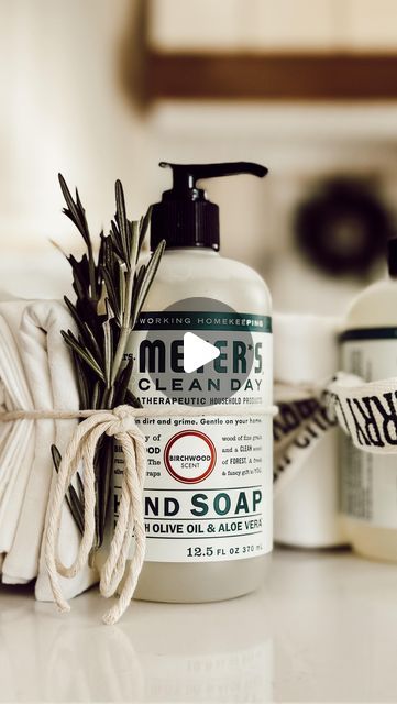 Heidi Samia | Eleanor Rose Home on Instagram: "If you find yourself in need of a last minute Christmas gift that radiates both charm and practicality, this one might be for you! This Christmas, give the simple gift of everyday luxury with yummy scented hand soap and a kitchen towel, that’s all tied together with a festive ribbon and a few sprigs of rosemary. I think this present is a gesture of warmth, love, and coziness for the ones you appreciate. After all, who doesn’t use (& love) fragrant soap and a quality kitchen towel? I believe that the best gifts are those that seamlessly weave into our daily lives, making each moment a little more thoughtful and special. Whether it’s for a neighbor, hostess, friend, or anyone on your Christmas list, this gift is not only easy to put together but Hostess Gift Ideas Baby Shower Gifts, Christmas Kitchen Towel Gift Ideas, Mrs Meyers Christmas Gift, Soap And Towel Gift Ideas, Hand Towel Gift Ideas, Hand Soap Gift Ideas, Soap Christmas Gift Ideas, Neighbor Gifts Christmas, Christmas Gifts For Neighbors