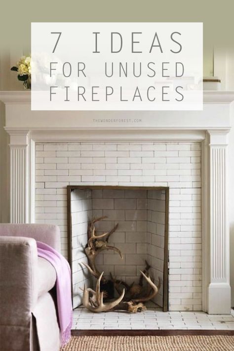 7 Awesome Ideas for an Unused Fireplace | Wonder Forest Unused Fireplace, White Brick Fireplace, Bedroom Transformation, Deer Heads, Bedroom Arrangement, White Fireplace, Faux Fireplace, Up House, Home Fireplace