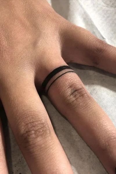 30+ Wedding Ring Tattoo Designs for Eternal Love - Tweakbee Wedding Finger Tattoo Ideas, Finger Tattoo For Man, Flame Ring Tattoo, Male Ring Finger Tattoo, Ring Tattoo Designs Men, Mens Tattoo Wedding Band, Men’s Wedding Band Tattoos, Male Ring Tattoo, Men’s Ring Tattoo Designs