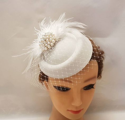 https://elegancehatinator.etsy.com/listing/1401245763 Sustainable Dresses, Bird Cage Veil, Feather Hair Pieces, Veil Fascinator, Cage Veil, Bridal Birdcage Veils, Ivory Fascinator, Bridal Fascinator, Blusher Veil