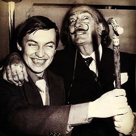 Happy Birthday to Anatoly Karpov! . . Here pictured with the artist Salvador Dali in New York in 1979. Karpov  remembers; . "Salvador was accompanied by two gorgeous girlfriends from his fans, while I was followd by the KGB guy..." . . Karpov was the World chess Champion for 10 years (1975-85) . He was known for his precision and methodical style. His attritional play would wear opponents down and his method began to be known as the "boa constrictor" . "Happiness should always remain a bit incom Love Surrealism, Anatoly Karpov, Salvatore Dali, The Persistence Of Memory, Bobby Fischer, Salvador Dali Art, Sporting Legends, Dali Art, Chess Players