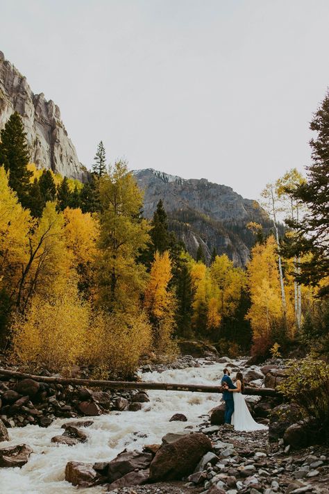 Ouray Colorado Elopement, Fall River Elopement, Adventure Wedding Ideas, Best Elopement Ideas, How to Elope in Colorado, Best Place to Elope, Fall Elopement, Moody Mountain Wedding Photos, Cozy Fall Elopement Inspiration, Elopement Day Activities, Wedding Dress with Train Fall Wedding Colorado, Autumn Mountain Wedding, Fall Elopement Ideas, Ouray Colorado Winter, Fall Mountain Elopement, River Elopement, Colorado Fall Wedding, Best Place To Elope, Activities Wedding