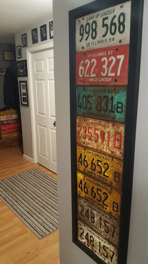 License Plate Display, License Plate Ideas Room Decor, Old License Plate Ideas Wall Art, Displaying License Plates, Uses For Old License Plates Ideas, Car Parts Decor Ideas, License Plate Wall Ideas, License Plate Ideas Decor, License Plate Bedroom Decor