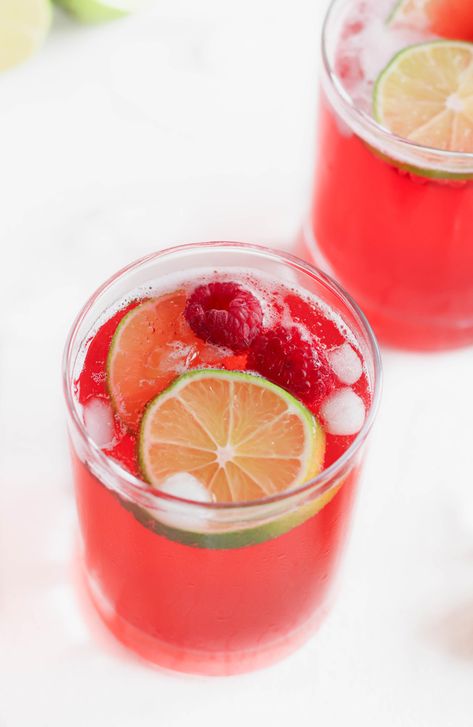 Raspberry Lime Sparkling Water is a delicious, non-alcoholic, party-friendly drink that guests will love! Whether you’re hosting or going, it’s super easy to make ahead of time. Oh, and it’s also perfect for a party of one or two, a good book, or a calm evening on the porch. #sparklingwater #sparklingwaterrecipes #strawberrylimerecipes #nonalcoholicbeverages | spiritedandthensome.com Sparkling Water Recipes, Alcoholic Party, Sparkling Water Drinks, Calm Evening, Lime Drinks, Lime Recipes, Coffee Drink Recipes, Water Recipes, The Porch